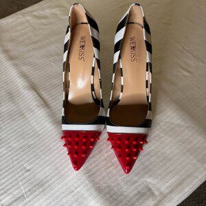 Wetkiss women's high heel pump. Size 9. Black and white zebra stripes .